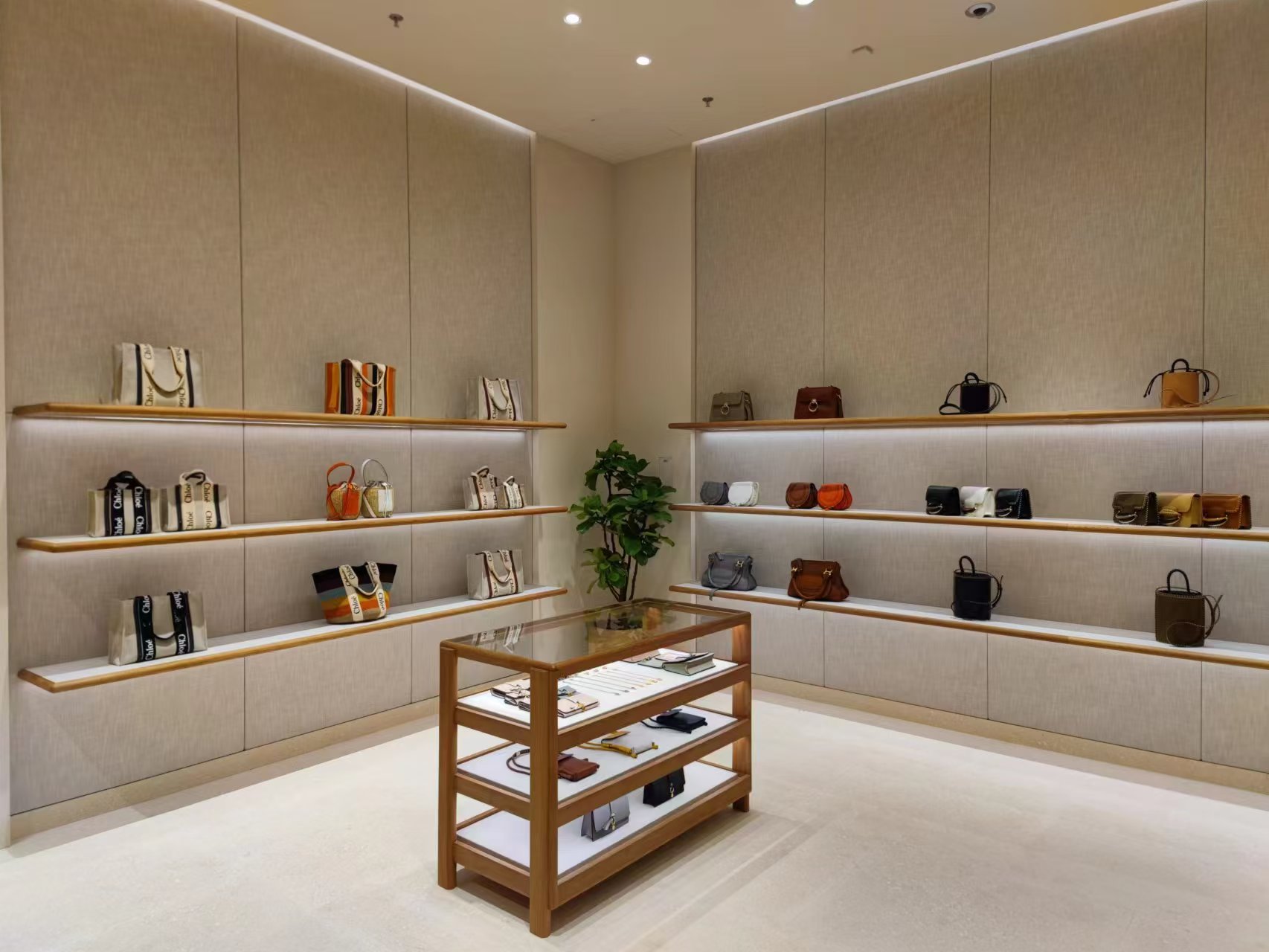 Chloé boutique interior with wooden cabinet display — Chongqing