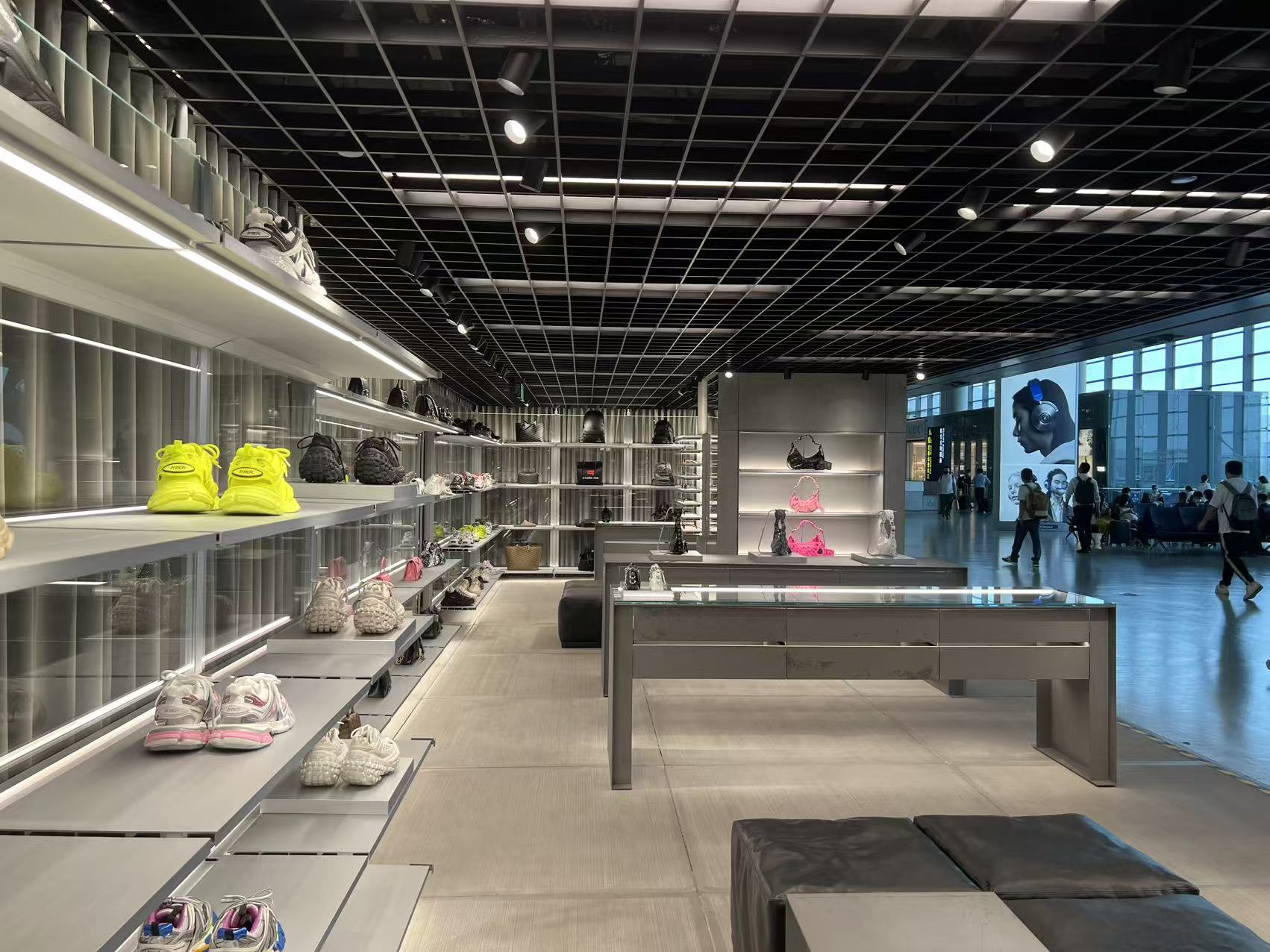 Sneaker and bag wall in travel retail